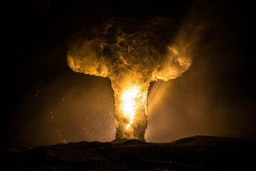 Nuclear war concept. Explosion of nuclear bomb. Creative artwork decoration in dark.