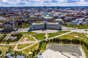 a panoramic view of the beautiful architectural buildings and solutions of the park and the Volga river in the old district of Kazan filmed from a drone 