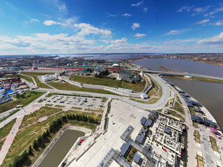a panoramic view of a large ancient Kremlin-fortress on a sunny day in the old part of Kazan filmed from a drone 