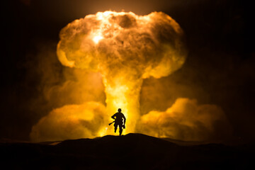 Nuclear war concept. Explosion of nuclear bomb. Creative artwork decoration in dark.