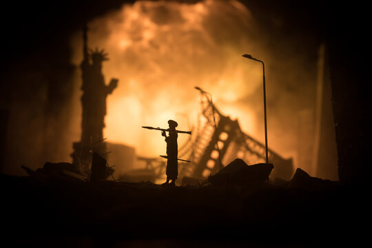 Military soldier silhouette with bazooka. War Concept. Military silhouettes fighting scene on war fog sky background, Soldier Silhouette aiming to the target at night.