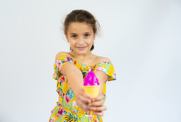 Adorable little girl with delicious ice cream isolated over white background