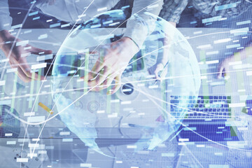 Double exposure of man and woman working together and business theme hologram drawing. Computer background. Top View.