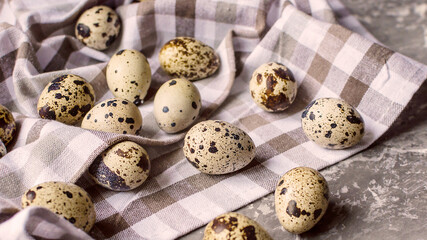 quail eggs in the kitchen stone background 