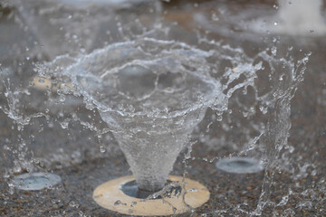 water fountain drops frozen mid air 