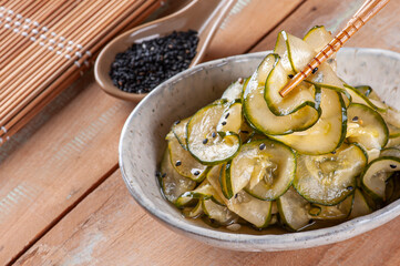 .Traditional Japanese cuisine salad called Sunomono. Made with cucumber and black sesame