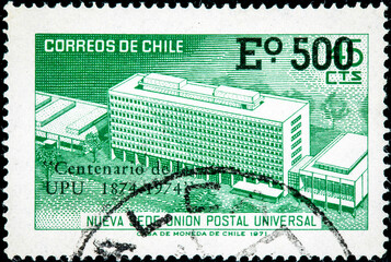 stamp printed in Chile shows the new headquarters of the universal postal union, UPU, on its centenary
