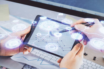 Double exposure of man's hands holding and using a phone and social network theme drawing.