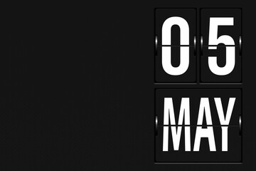 May 5th. Day 5 of month, Calendar date. Calendar in the form of a mechanical scoreboard tableau. Spring month, day of the year concept.