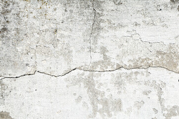 Obraz premium stone wall with broken plaster. background. texture