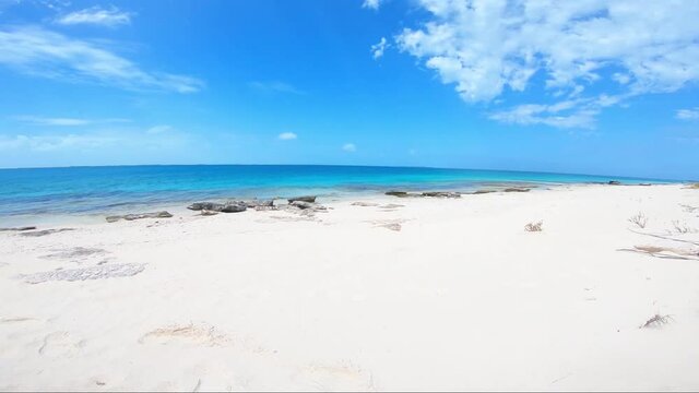 Great tropical beach scene  pan rigth of The Shore beach white sand and blue sky  los roques ,  venezuela  Fantastic, landscap