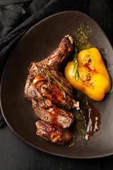 Roasted steak in frying pan on dark background - 431523209
