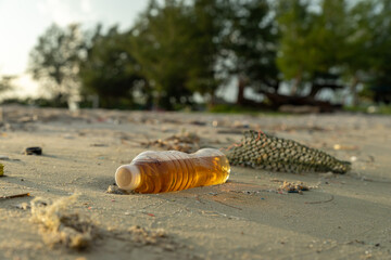 Garbage on the beach. Dirty sea sandy. Trash on beach. plastic bottle. Love the world. Pollution of beaches and sea