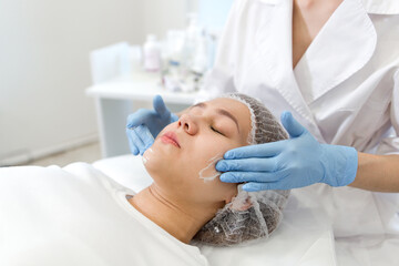 Cleaning the girl's face close-up