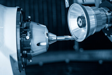 The ball end mill tool type regrinding process control by CNC program. The CNC milling cutting tool...