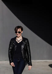 smiling woman in leather jacket