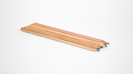 Wooden pencil on white background
