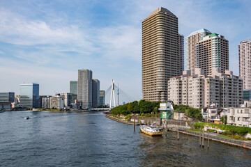 Fototapeta premium Modern buildings in Tokyo Bay, Japan. Scenery of skyscrapers in Tokyo.