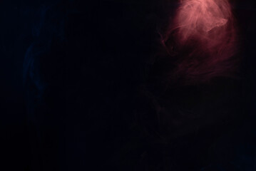 Blue and pink steam on a black background.