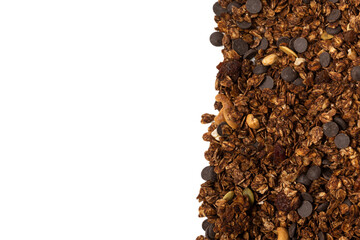 Chocolate granola cereal with nuts background.