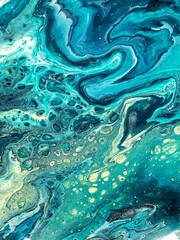 Creative abstract hand-painted background, wallpaper, texture, close-up fragment of acrylic painting on canvas, blue, green, gold paint. Contemporary art. Trend Art