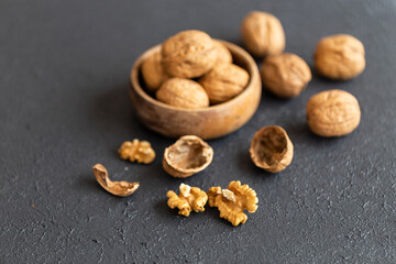 Fototapeta na wymiar Images of walnuts on an insulated table. Walnut is a very useful type of walnut for humans.