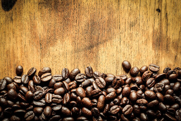 coffee beans on wood background