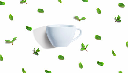 Fresh mints with tea cup overhead view