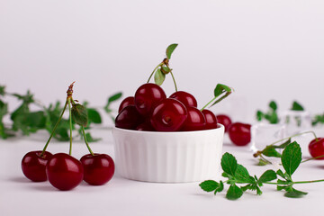 Cherry. Ripe sweet cherry on a white background. 