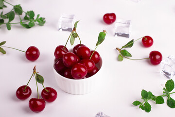 Cherry. Ripe sweet cherry on a white background. 