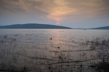 landscape view with lake,blue sky,sun set