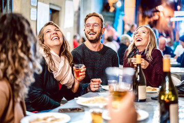 Happy friends having fun drinking white wine at street food festival - Young people eating local plate at restaurant reopening together - Travel and dinning lifestyle concept on azur light neon filter - 431546008