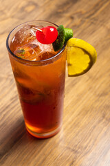 Tropical cocktails on wooden background. Frutal alcoholic cocktails. Colorful drinks concept.