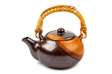 Traditional brown earthenware ceramic teapot with lid isolated on white background