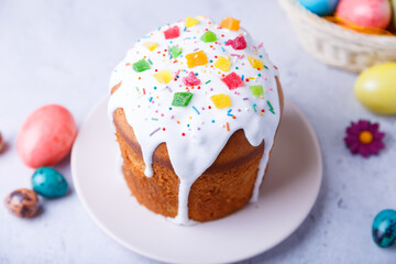 Easter cake with candied fruits and colored eggs. Traditional Easter baking. Easter holiday.