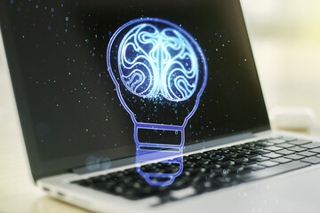 Creative idea concept with light bulb and human brain illustration on modern laptop background. Neural networks and machine learning concept. Multiexposure