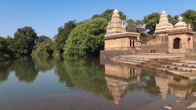Wai , Maharashtra India- February 20 2021: Menawali ghat and temple with beautiful view of lake and greenery