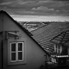 Bratislava cityscape with houses and A|pollo bridge in black and white, Slovakia