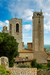 Fototapeta na wymiar San Gimignano The Torre Grossa and the bell tower of the cathedral