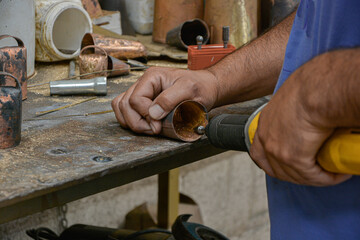 The forge, cowbell factory, craft work.