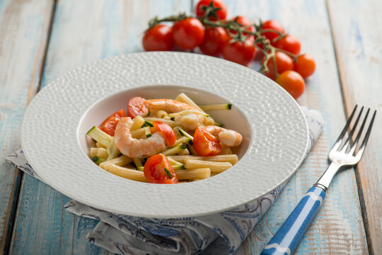 pasta with shrimp  fresh zucchinis and tomato