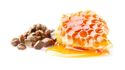 Honeycomb and propolis granules in closeup