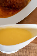 sauce boat with vanilla custard 