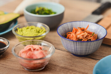 Still life various fresh ingredients on a cutting board for sushi