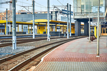 Fototapeta premium Platform for boarding passengers on long-distance trains.Rails and sleepers.