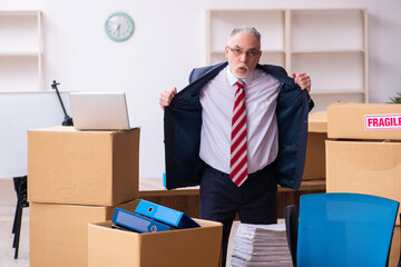 Old businessman employee in relocation concept