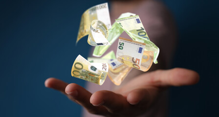 banking euro banknote in hand rain