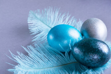 Colorful Easter eggs. Easter background. Minimalistic Easter concept on gray background. Card with copy space for text.