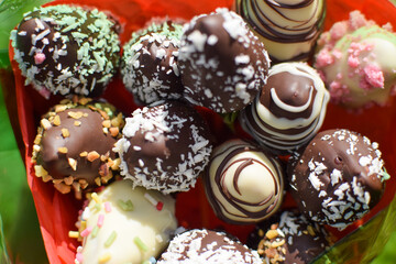 Bouquet of chocolate flowers with different textures and colours.