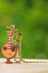 Lizard playing guitar